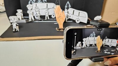 Das Bild zeigt ein Handy, mit welchem gerade ein Video gefilmt wird.